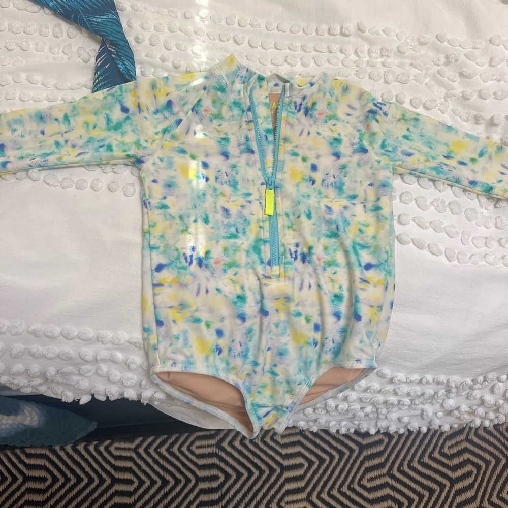 2 Long Sleeved Rash Guard Girls Swimsuits - very good used condition.